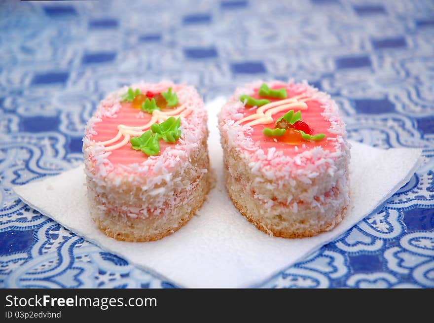 Two Tasty Beautiful Cakes In Cafe