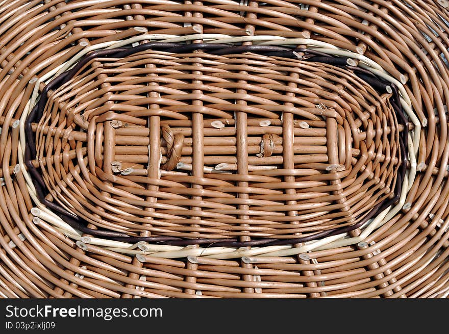 Wicker lid on the basket of brown willow. Wicker lid on the basket of brown willow