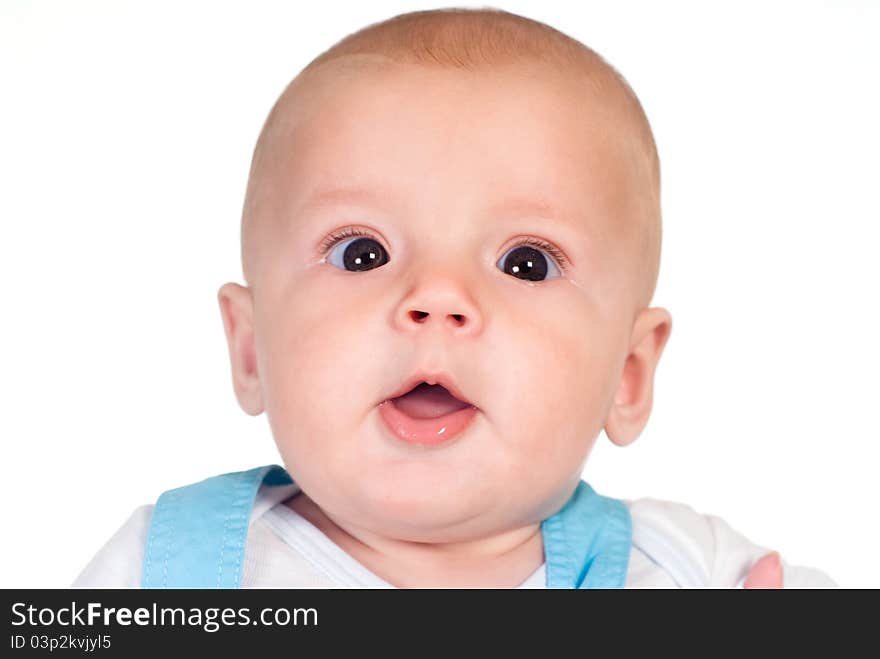 Portrait of a cute baby posing on a white. Portrait of a cute baby posing on a white