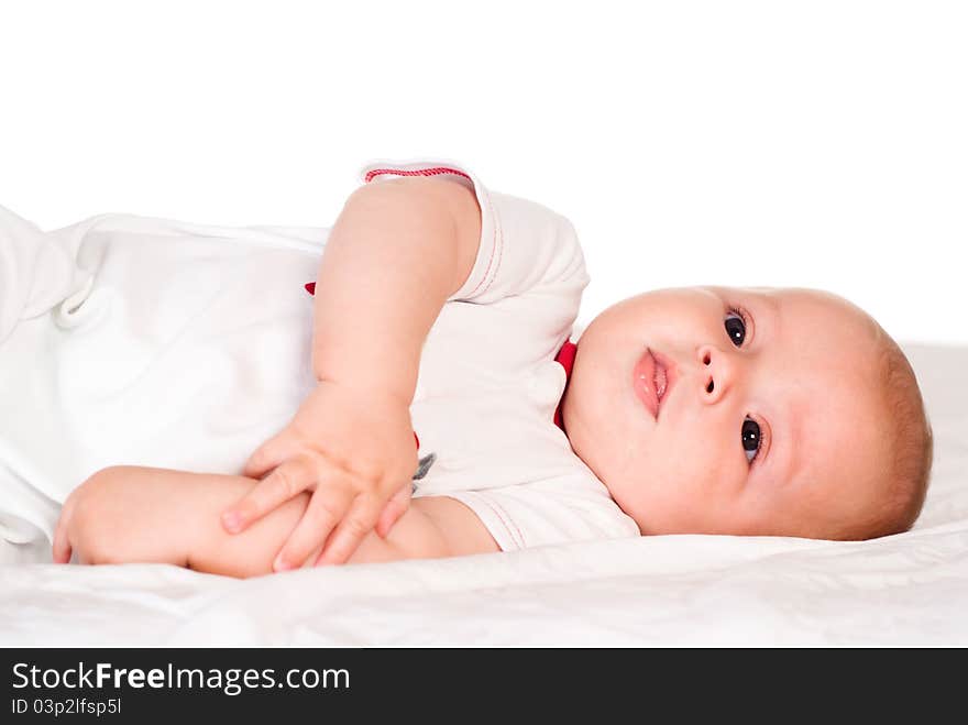 Portrait of a cute baby on a white. Portrait of a cute baby on a white