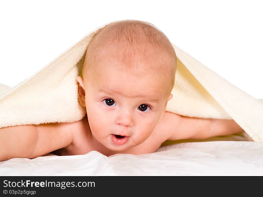 Baby under towel