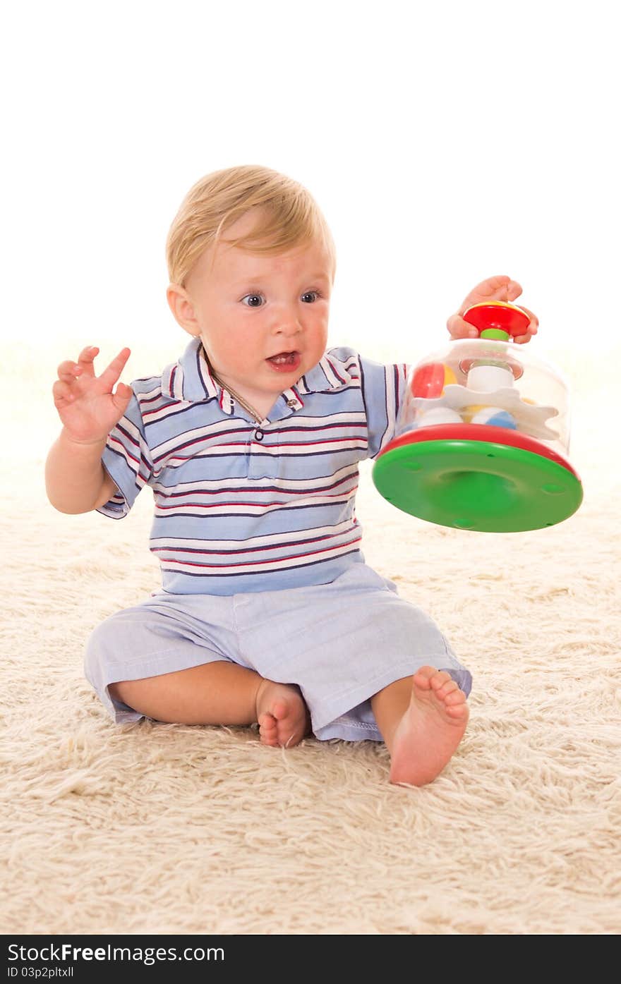 Little Boy On Carpet