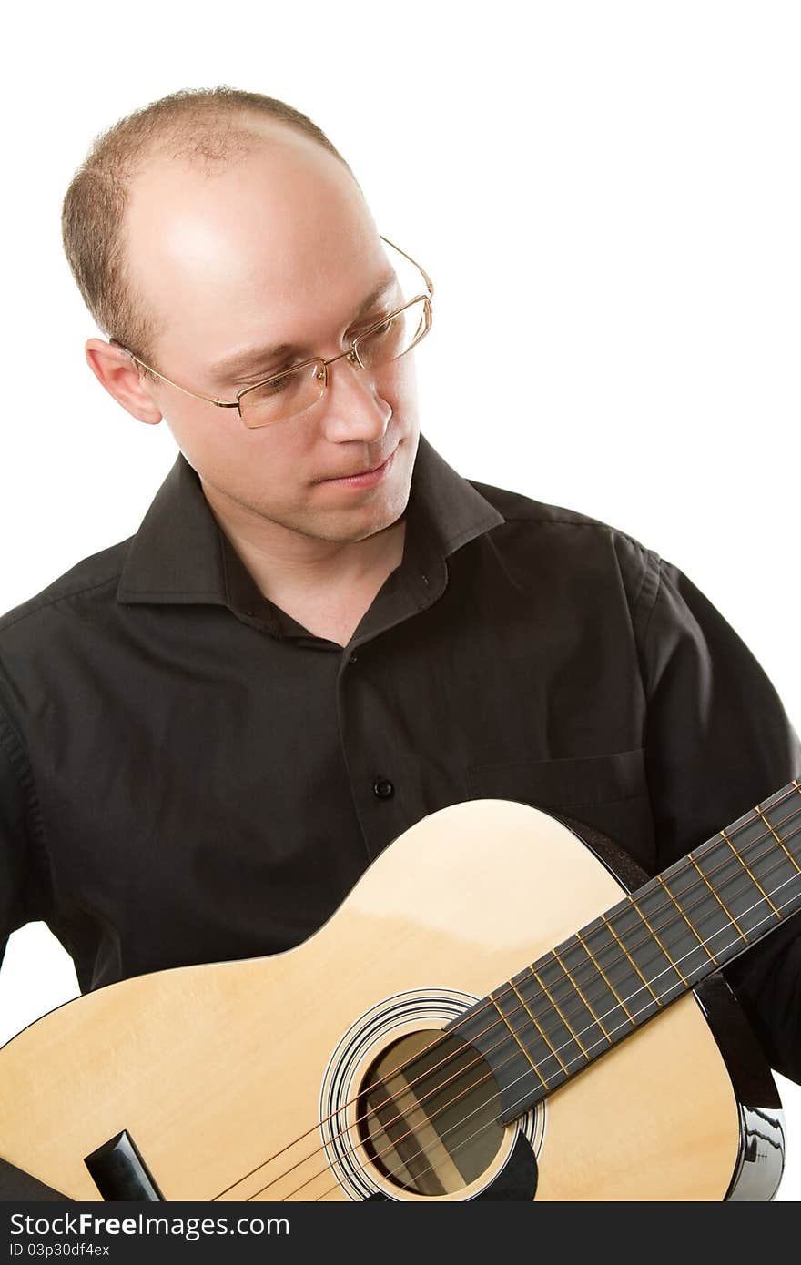 Singer in a black shirt and sunglasses playing guitar on white background. Singer in a black shirt and sunglasses playing guitar on white background