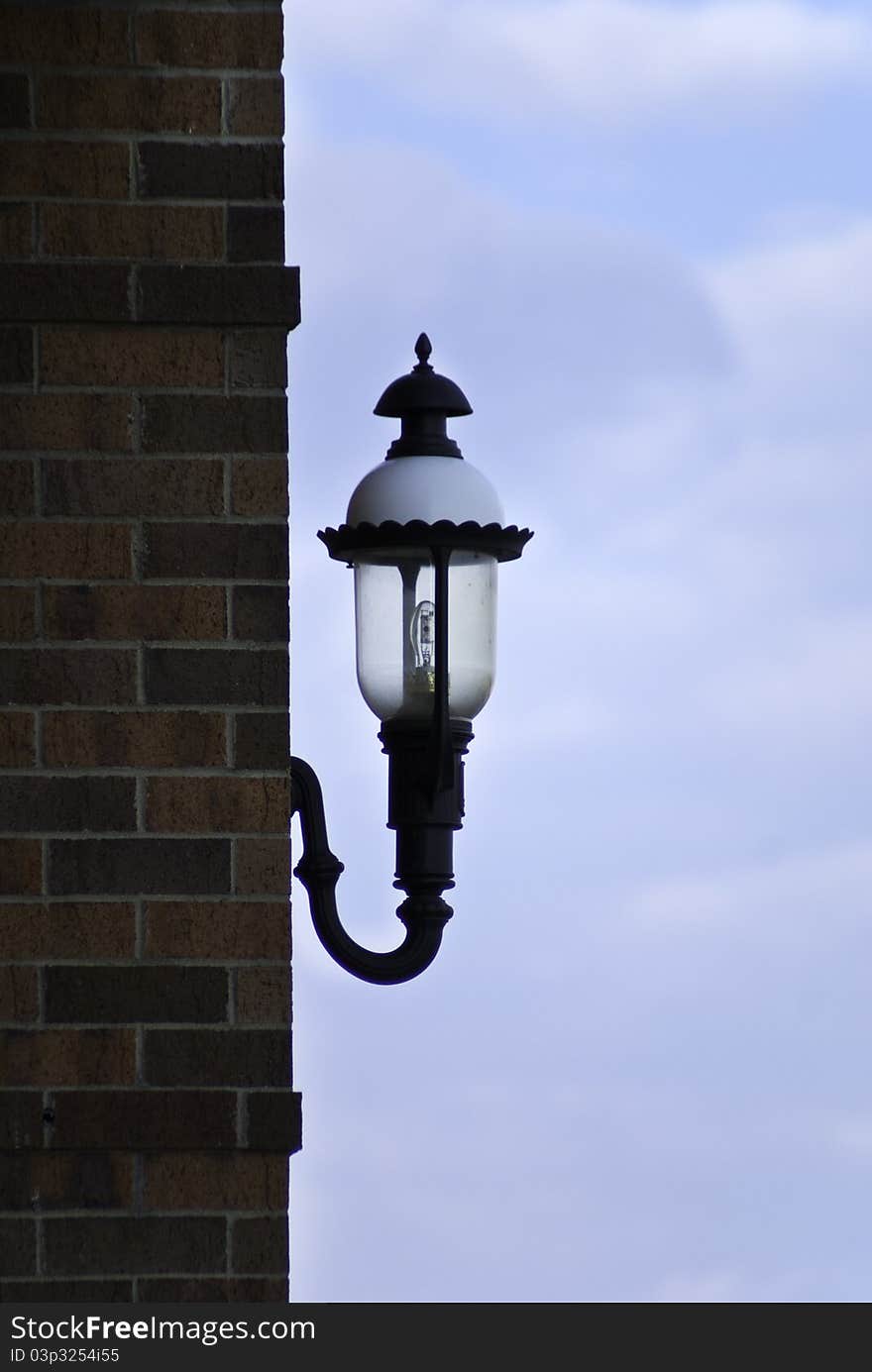 Ornate Lamp on a Builgind