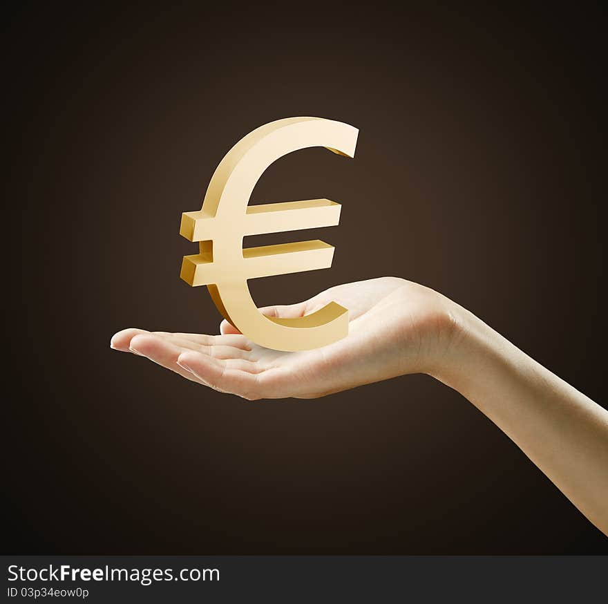 3d Gold Euro Sign on a hand.On a black background