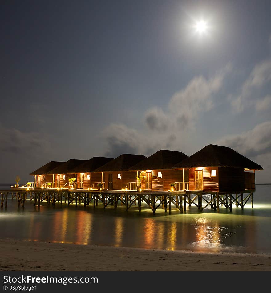 Water Villas in The Ocean under moonlight.. Evening Paradise. Maldives. Water Villas in The Ocean under moonlight.. Evening Paradise. Maldives.