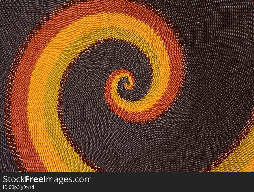 Close up photo of hand-made plaited plate as a background. Close up photo of hand-made plaited plate as a background