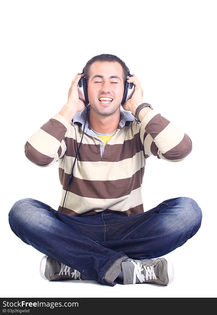 Man In Blue Shirt With Earphones