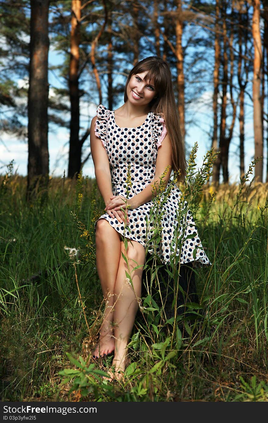 The beautiful girl in autumn wood