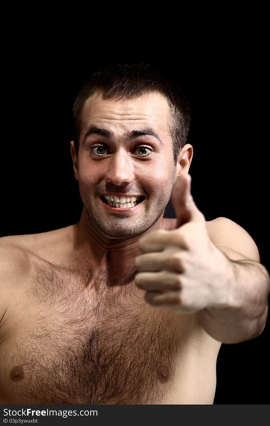 Young man face expressions over black background