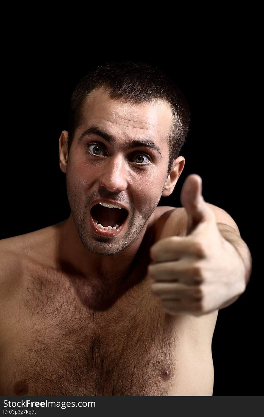 Young man face expressions over black background