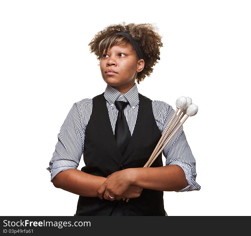 Young African musician in a serious pose against a white background in the studio. Young African musician in a serious pose against a white background in the studio.