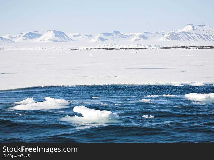 Arctic winter landscape - sea, glacier, mountains