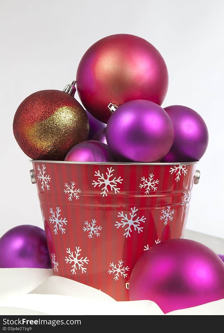 Bucket Of Christmas Balls On White