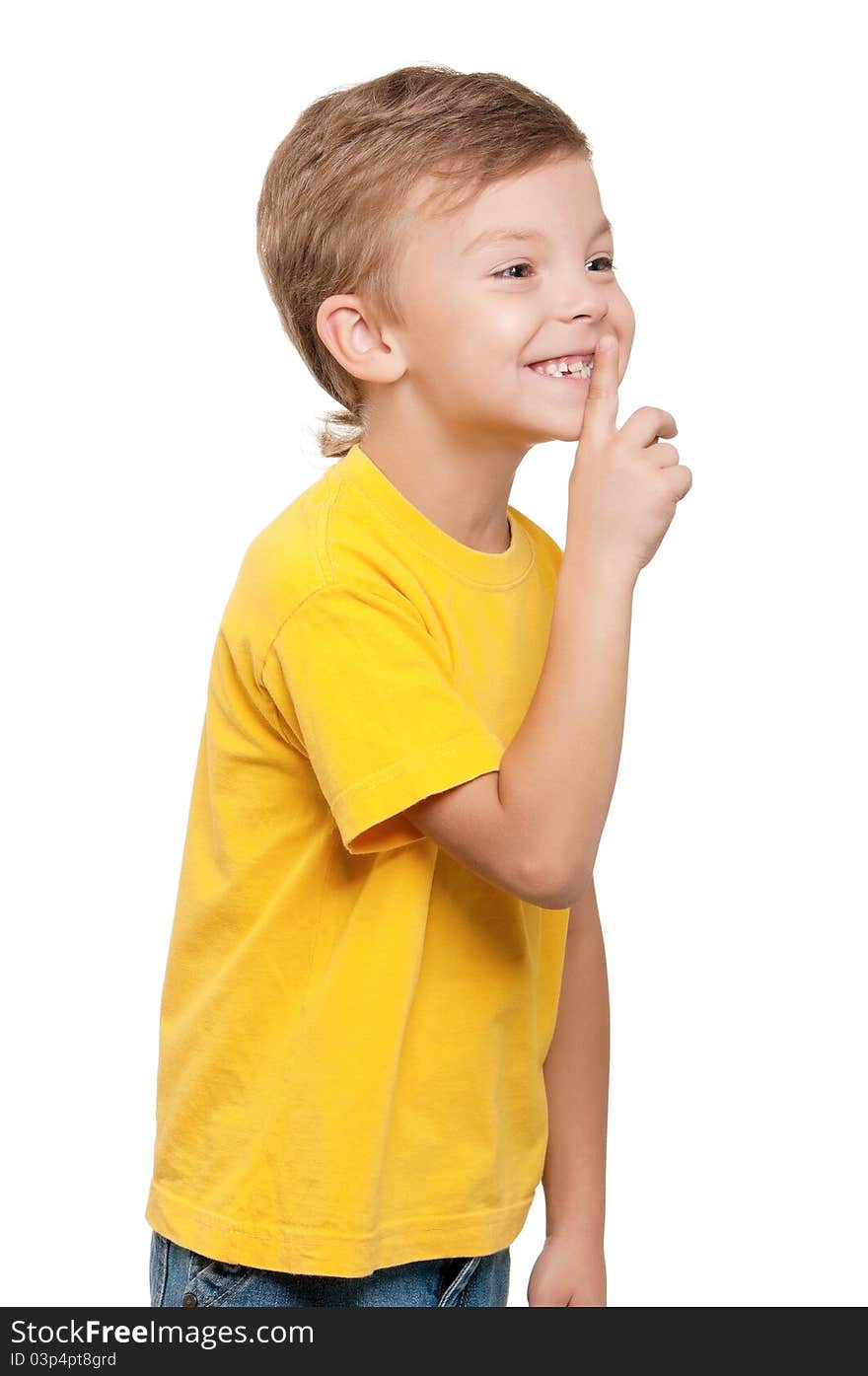 Portrait of beautiful little boy with silence gesture over white background. Portrait of beautiful little boy with silence gesture over white background