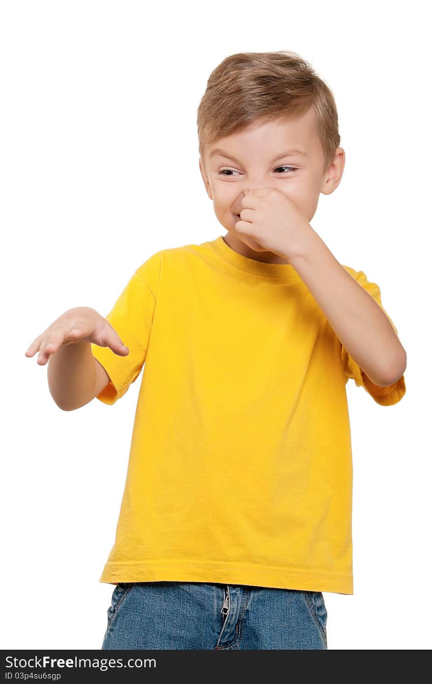 Portrait of little boy covering nose with hand on white background. Portrait of little boy covering nose with hand on white background