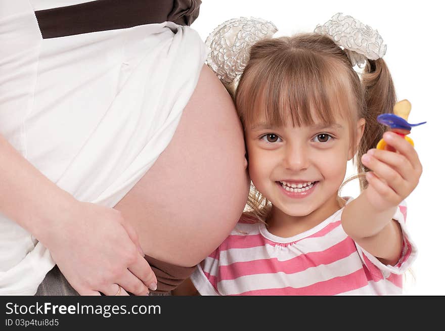 Pregnant women with her daughter - isolated over a white background. Third trimester. Pregnant women with her daughter - isolated over a white background. Third trimester.