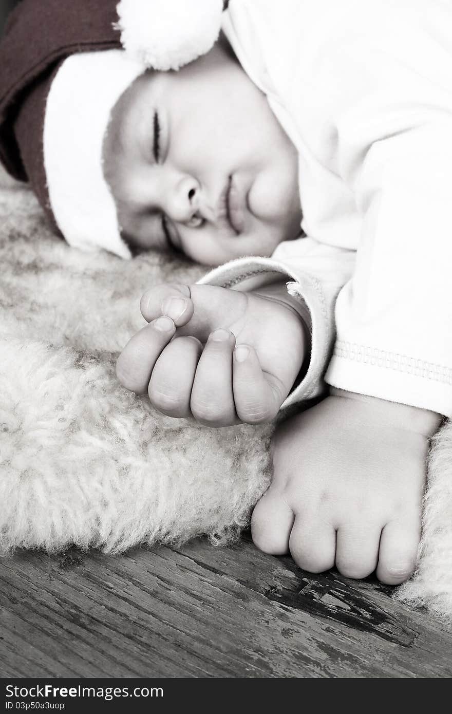 Baby wearing a christmas hat sleeping sound. Baby wearing a christmas hat sleeping sound