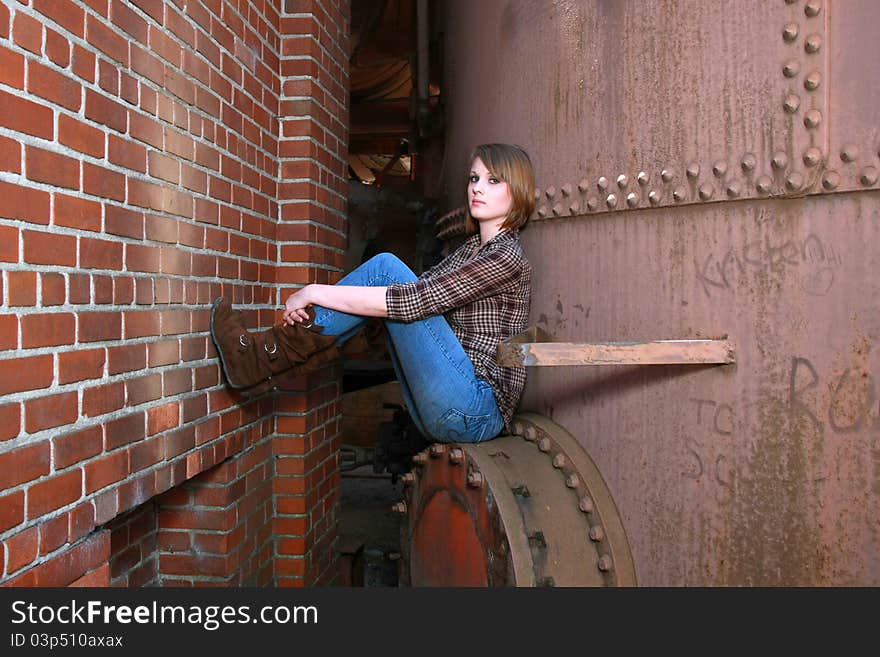 Young woman with legs propped up