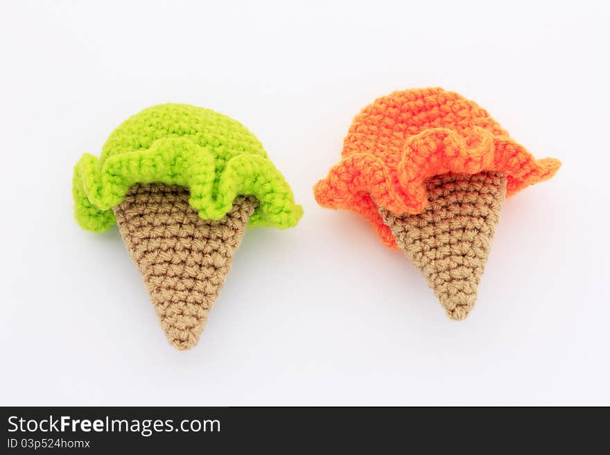 Cute ice cream crochet patterns in orange and green color. Cute ice cream crochet patterns in orange and green color