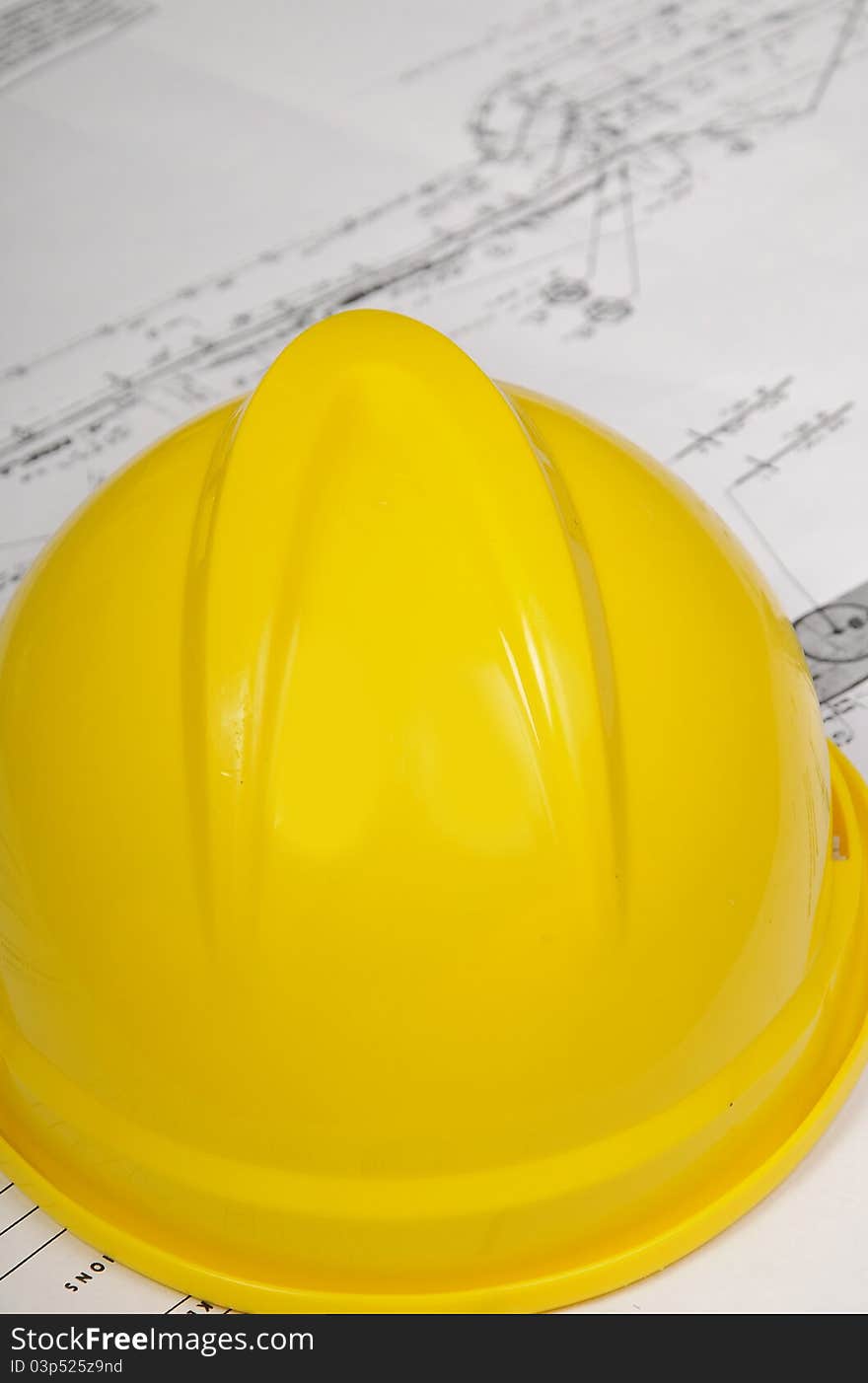 Construction worker's hard hat and Plans