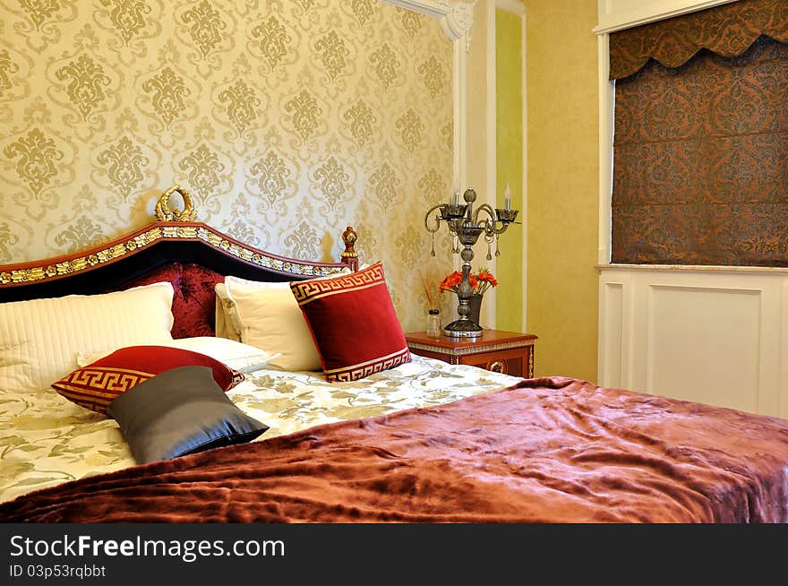 Luxury and noble style bedroom internal, with featured wall paper and decoration, shown as luxury, classical, and comfortable living environment. Luxury and noble style bedroom internal, with featured wall paper and decoration, shown as luxury, classical, and comfortable living environment.