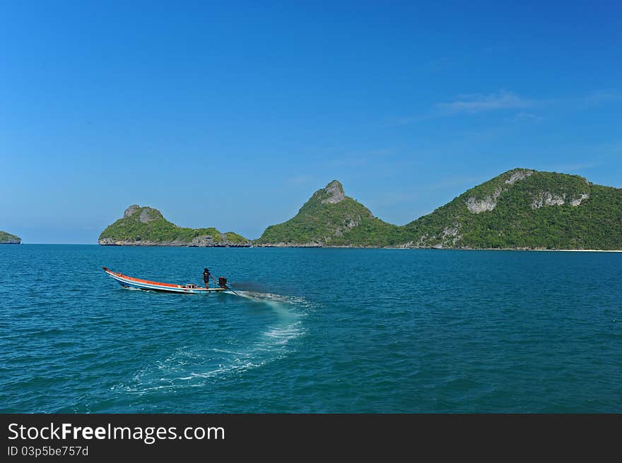 Boat with small engine in sea, Thailand. Boat with small engine in sea, Thailand