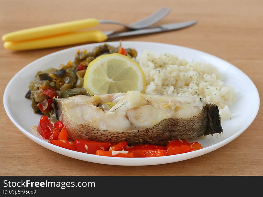 Boiled fish with rice and vegetables