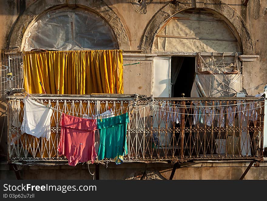 Clothes drying on an apartment balcony. Clothes drying on an apartment balcony