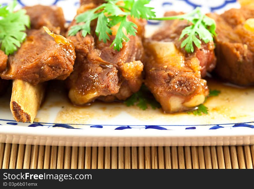 Pork ribs with sweet sauce  on white background