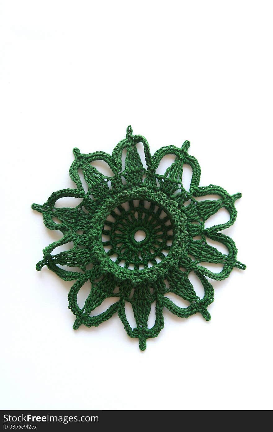 Isolated green star in crochet technik. Isolated green star in crochet technik