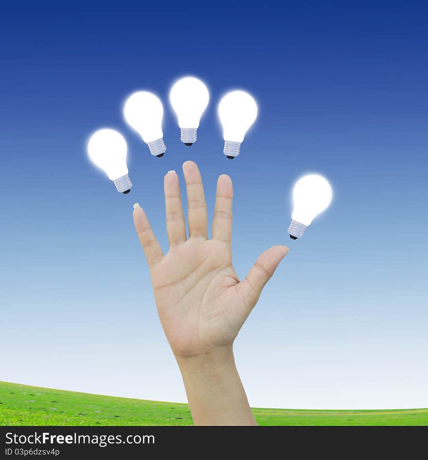 Women hand with Light bulb