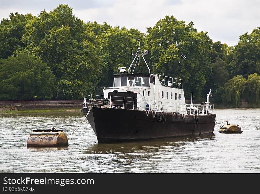 A boat on the river Thames in London, UK