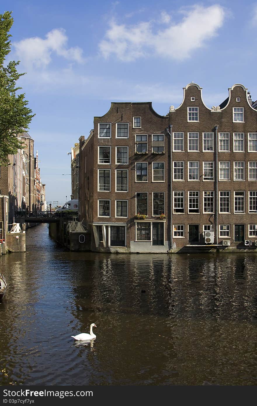 Water street in historic center of Amsterdam. Water street in historic center of Amsterdam