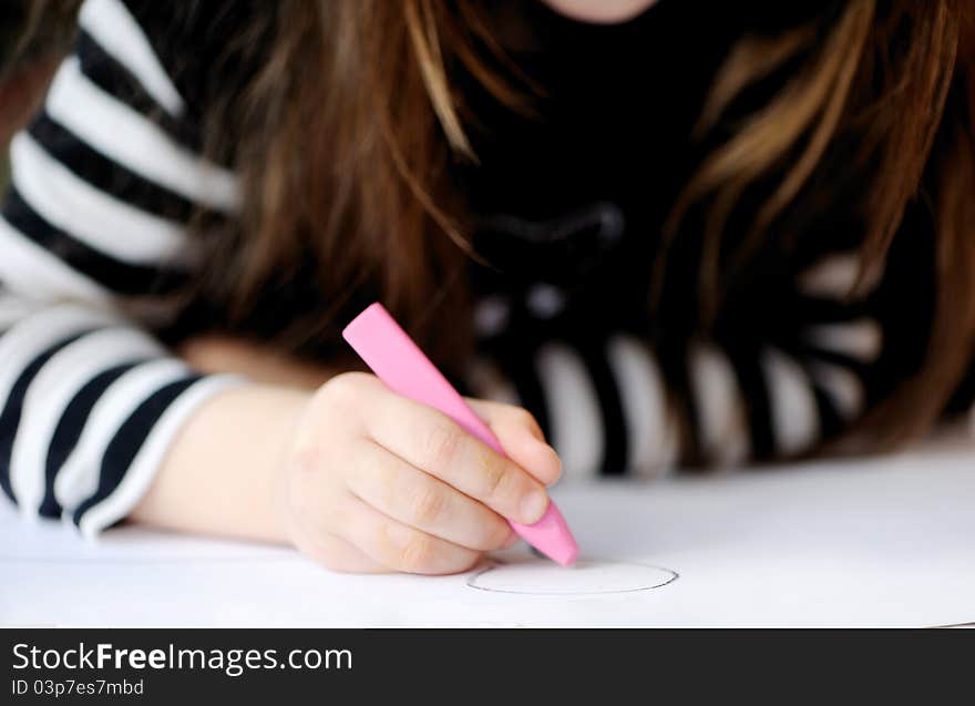 Young Girl Draws A Picture For Halloween Party