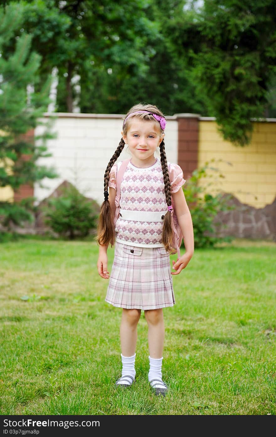 Young Girl With Pink Backpack Ready For School