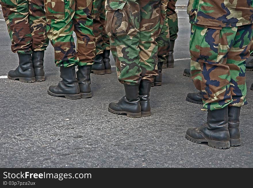 System of soldier's feet in boots. System of soldier's feet in boots