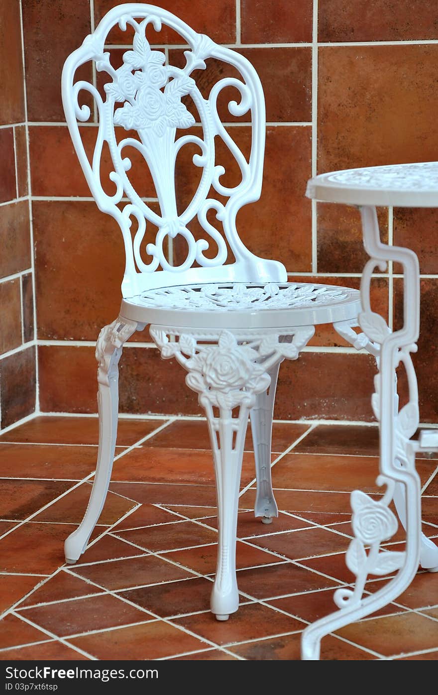 Iron table and chair in carving