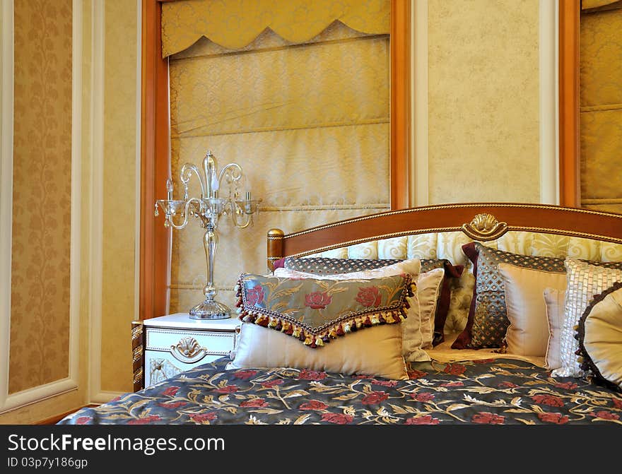 Luxury and noble style bedroom internal, with featured wall paper and decoration, shown as luxury, classical, and comfortable living environment. Luxury and noble style bedroom internal, with featured wall paper and decoration, shown as luxury, classical, and comfortable living environment.