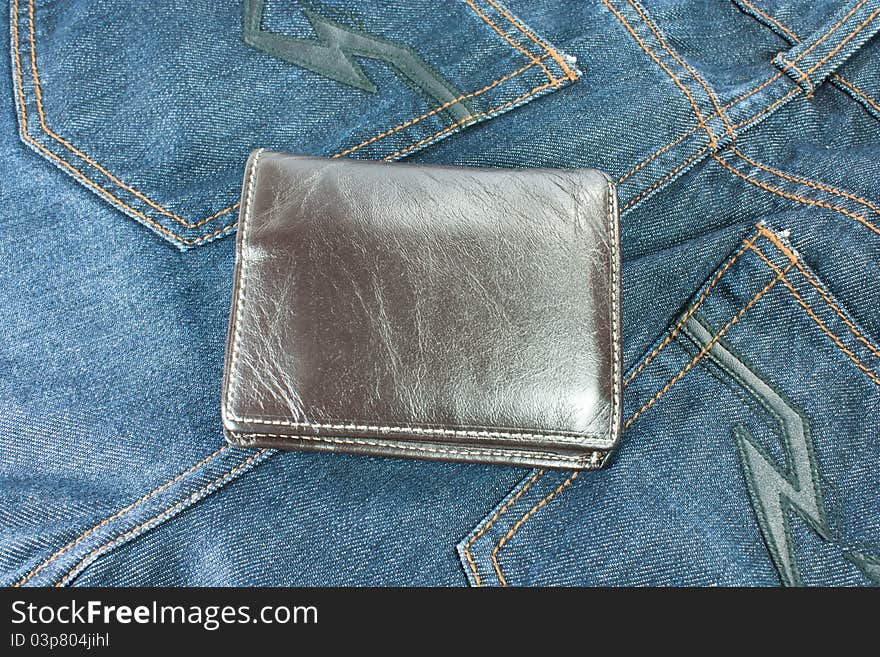 Brown leather wallet, put on jeans for men.