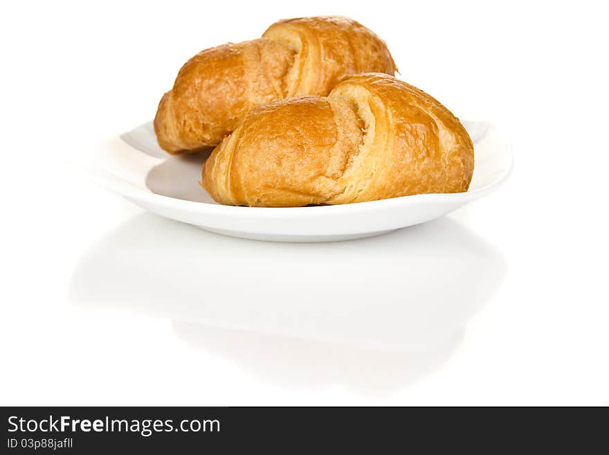 French croissants over white background. French croissants over white background