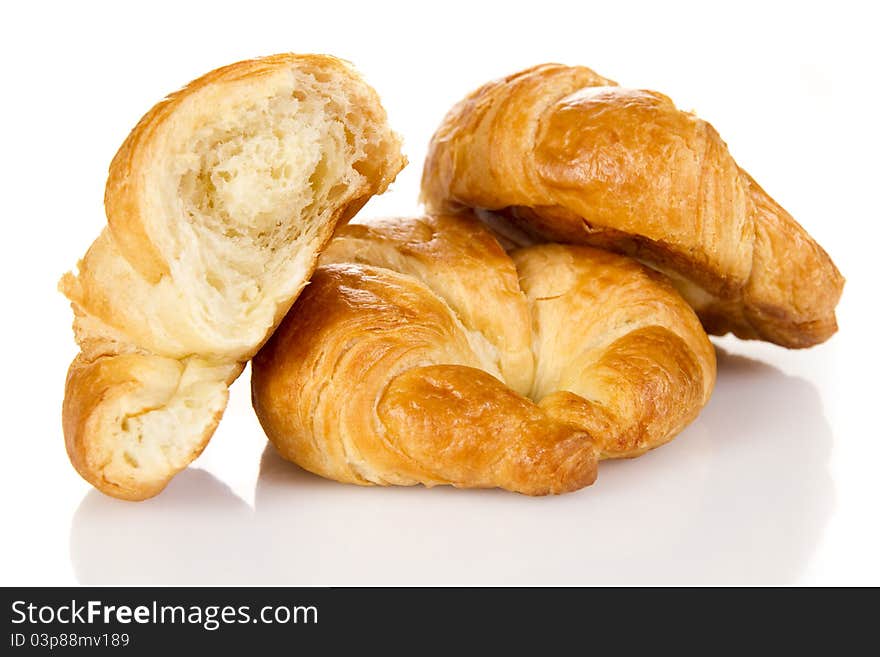 French croissants over white background. French croissants over white background