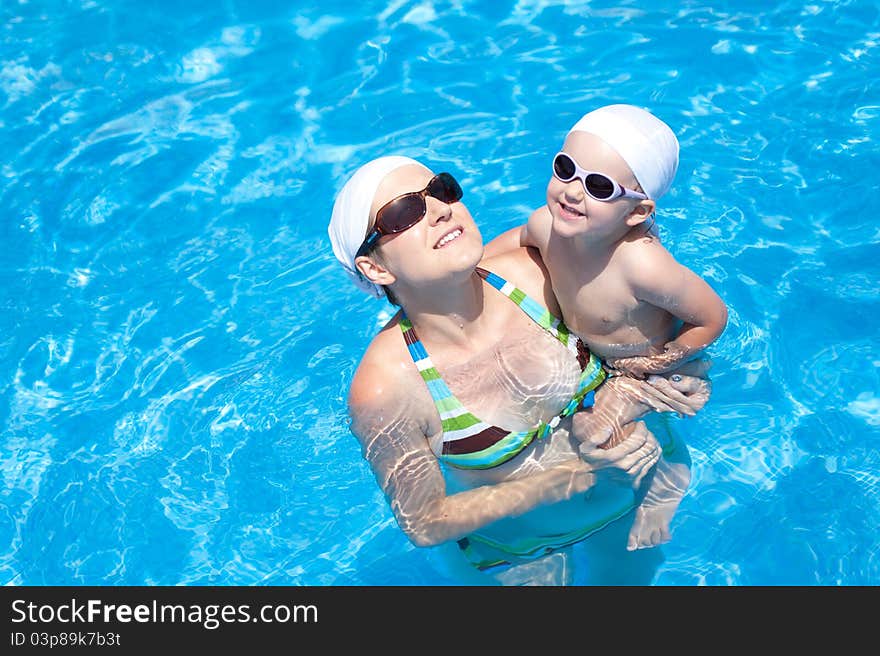 Mother and baby are swimming