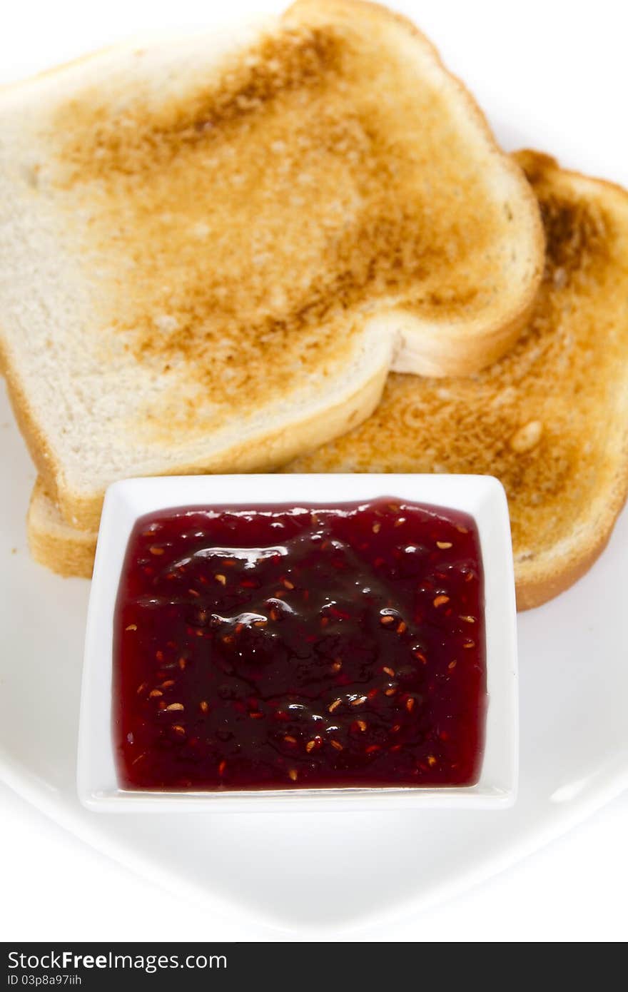 Toasts with jam over white background. Toasts with jam over white background