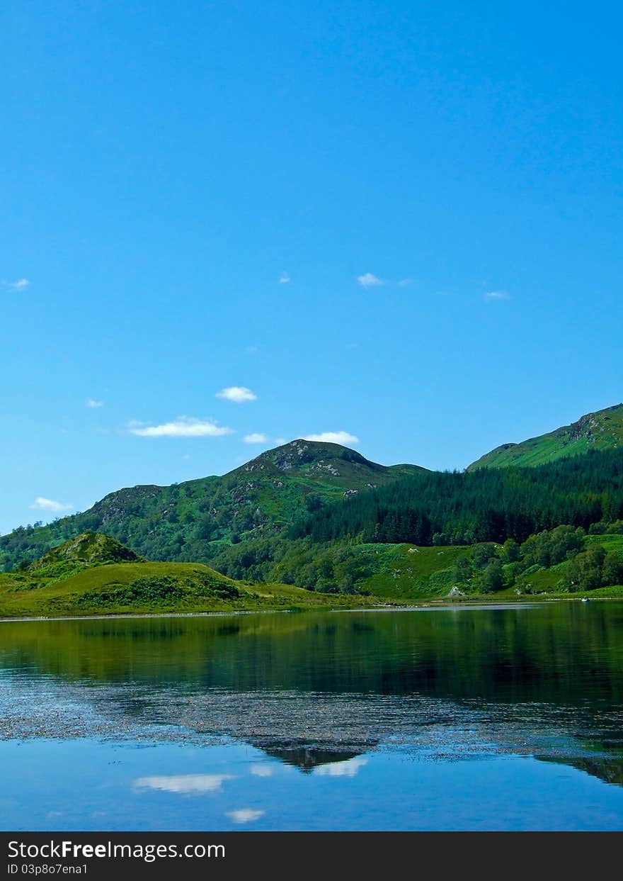 Mountain And Sky Reflections Portrait