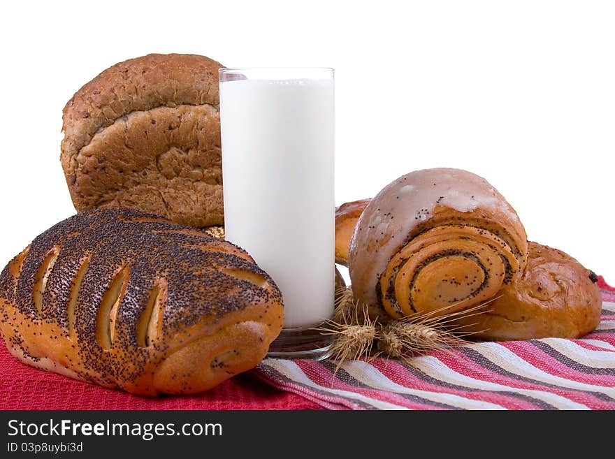 Milk and bread isolated on a white background. Milk and bread isolated on a white background