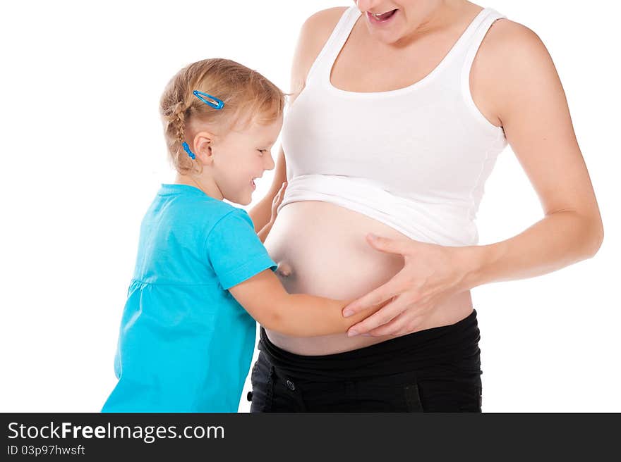 Child hold pregnant belly of mother