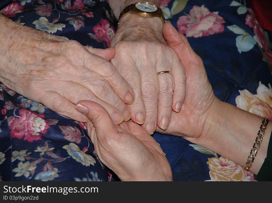 Comforting hands of mother and daughter. Comforting hands of mother and daughter