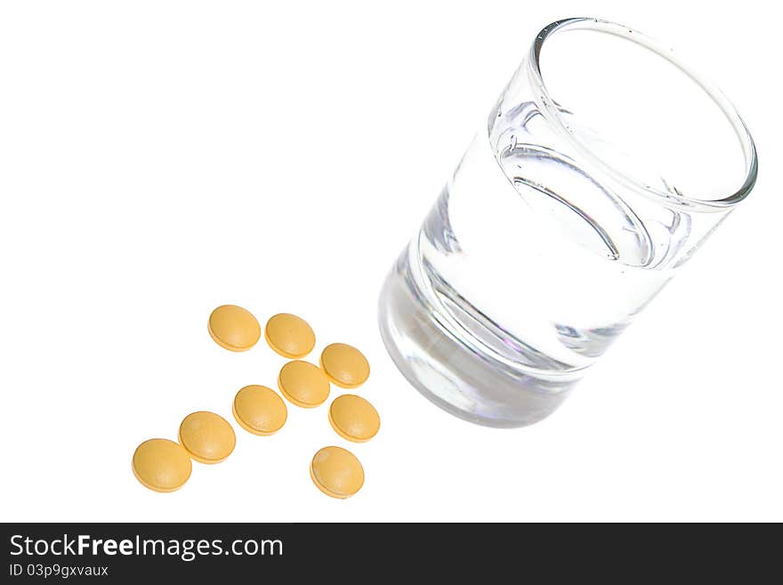 Glass of Water and Pills on white background