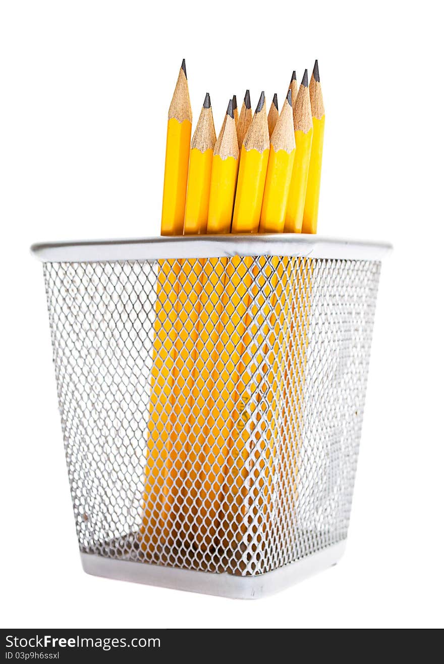 Pencils in pencil holders isolated on white